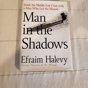 Man In The Shadows Hardcover Book